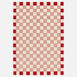 Checkered indoor/outdoor rug pink and red