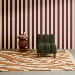 Children's armchair with rounded legs in rubberwood and boucle fabric
