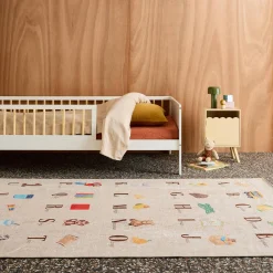 Children's indoor rug beige with French alphabet print