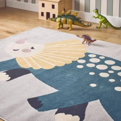 Children's light grey interior rug with dinosaur print