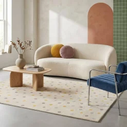 Children's rug with large colourful polka dots