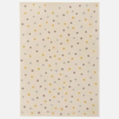 Children's rug with large colourful polka dots
