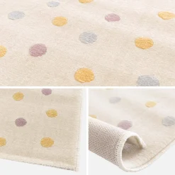 Children's rug with large colourful polka dots
