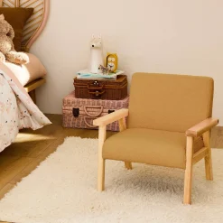 Children's scandi-style armchair in boucle fabric, rubberwood