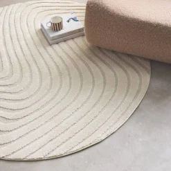 160cm interior rug with wavy patterns, cream
