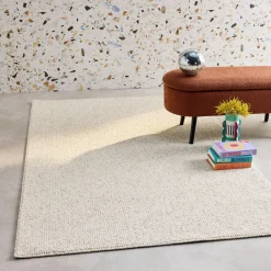 Cream mottled effect loop pile interior rug