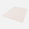 Cream mottled effect loop pile interior rug