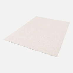 Cream mottled effect loop pile interior rug