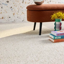Cream mottled effect loop pile interior rug