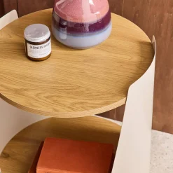 Curved metal side table or bedside table with wood decor and casters