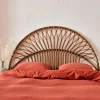 Dark rattan headboard