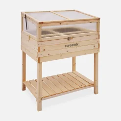 Elevated wooden planter with polycarbonate greenhouse