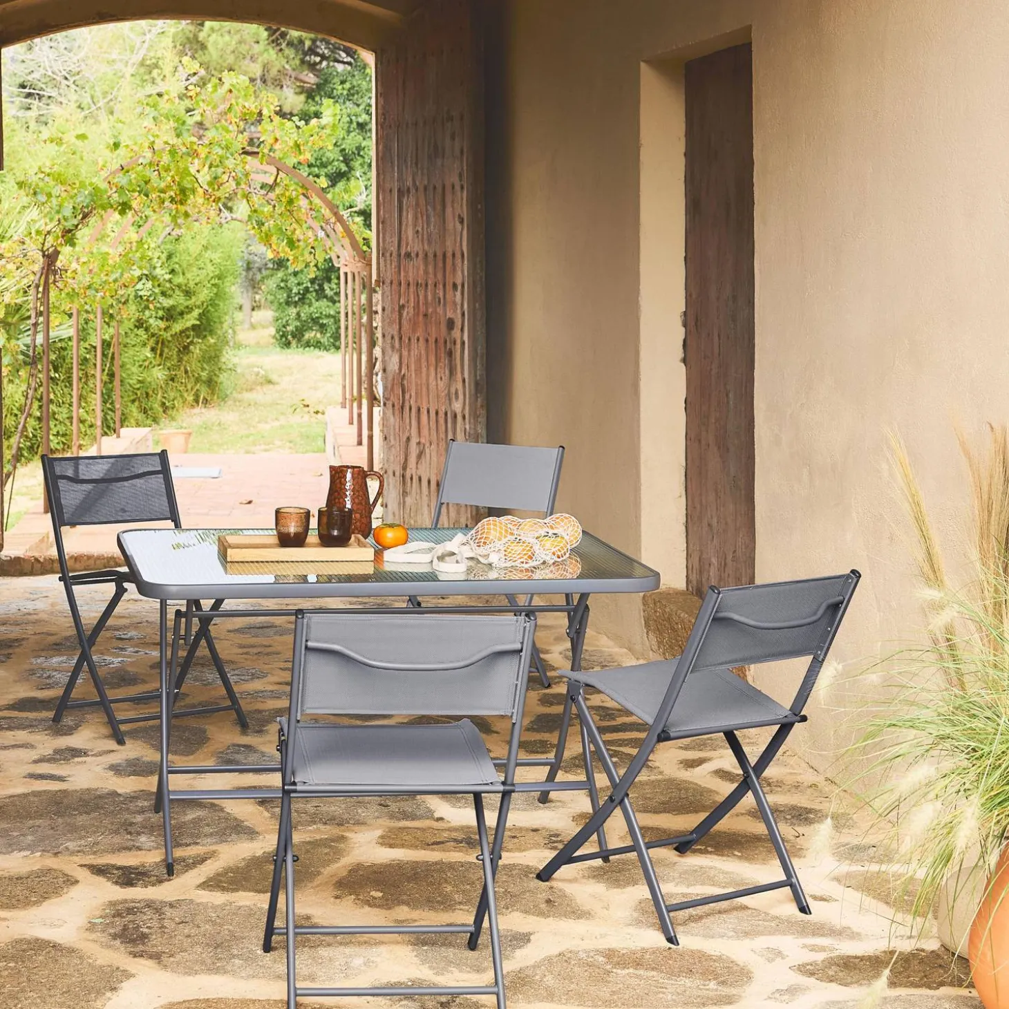Folding steel garden table + 4 chairs
