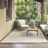Indoor/outdoor rug with beige arch pattern, recycled polyester