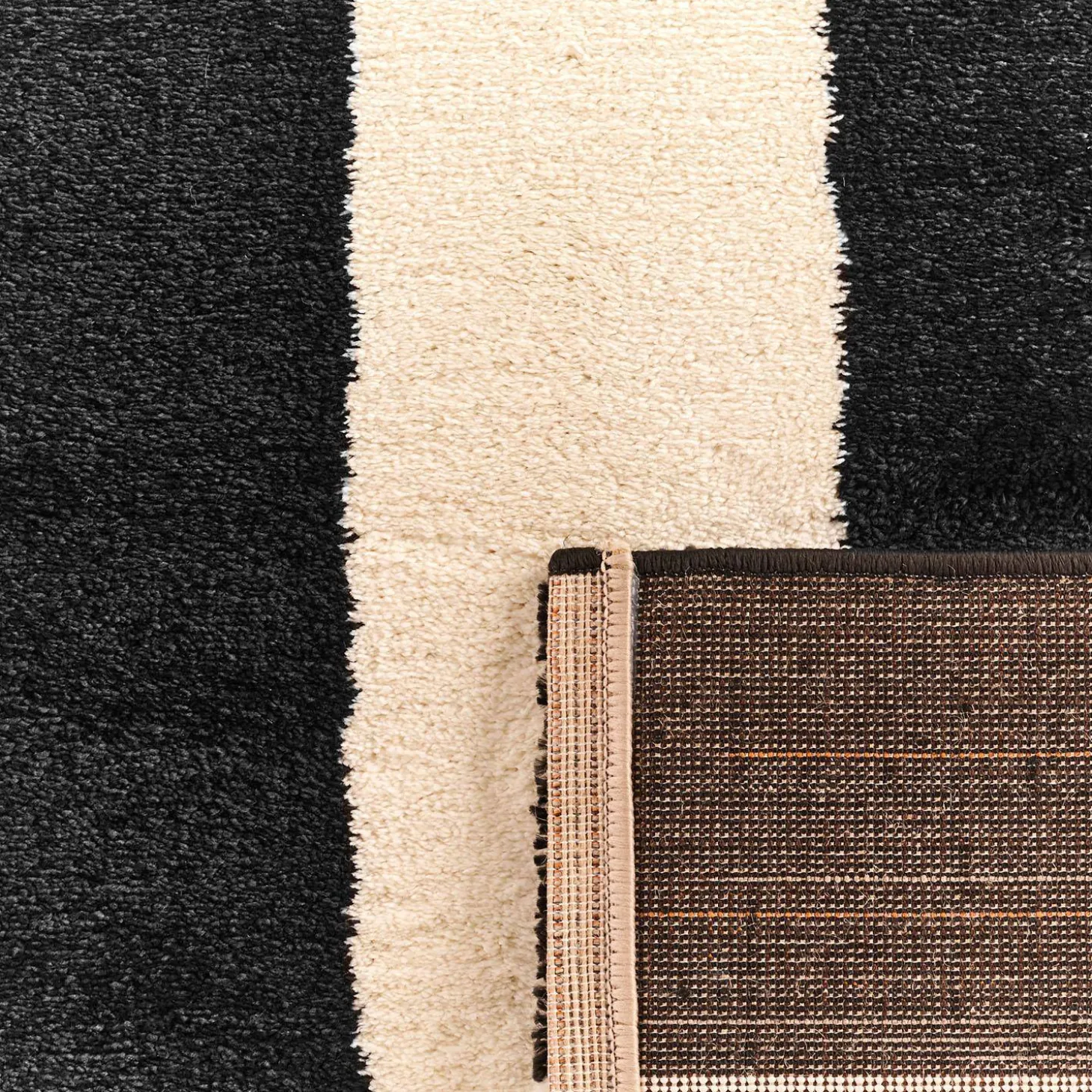Indoor rug black and white stripes