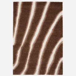 Indoor rug with brown striped pattern