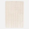 Indoor rug with linear pattern cream