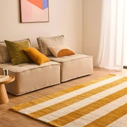 Indoor rug with ochre and white stripes
