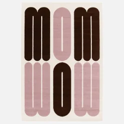 Indoor rug with pink and brown graphic pattern