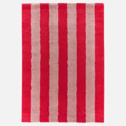 Indoor rug with red and pink stripes