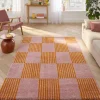 Interior checkered rug orange and pink