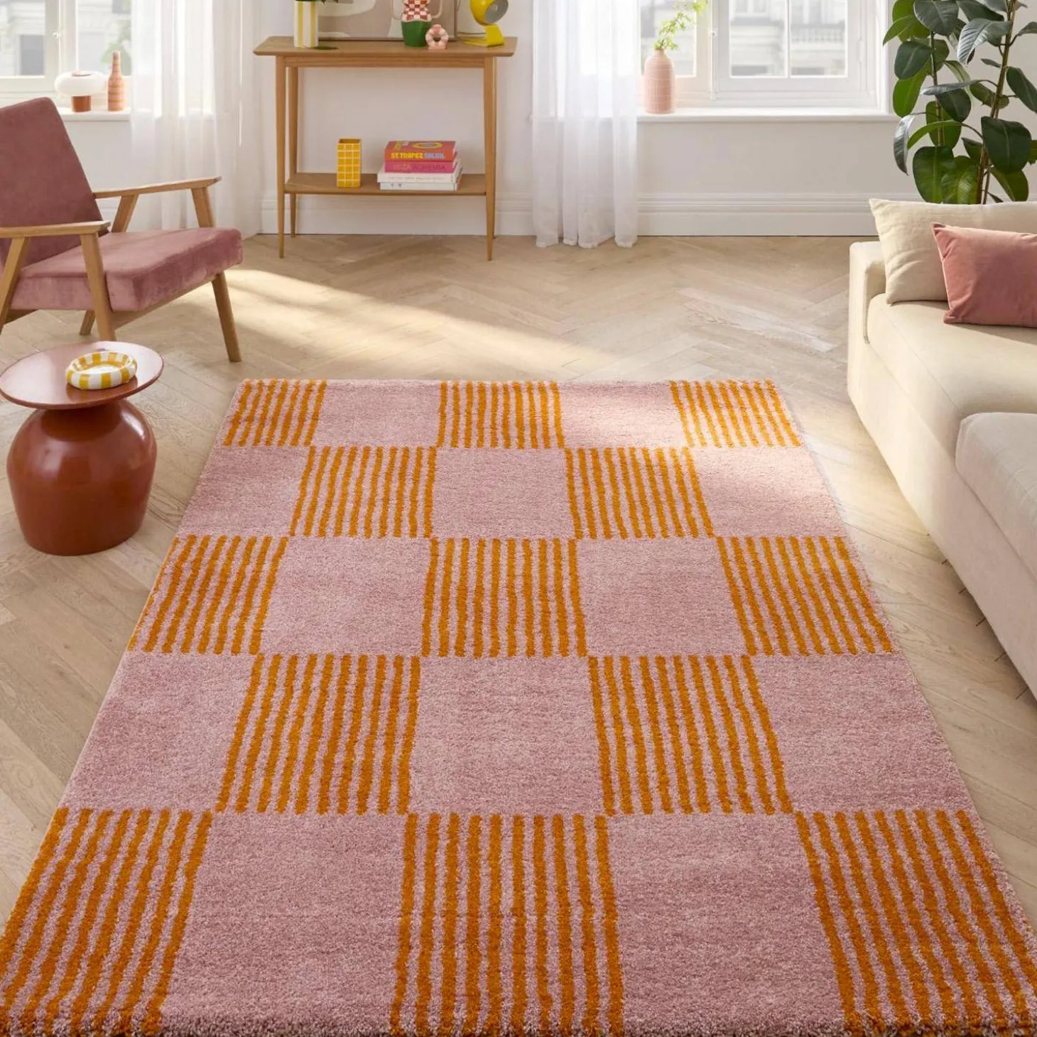 Interior checkered rug orange and pink