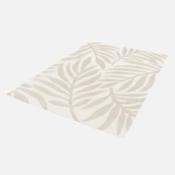 Interior/exterior rug with cream, beige floral pattern