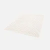 Interior rug cream embossed plant motif
