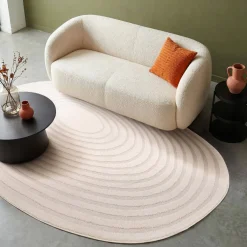 Interior rug pebble-shaped circular pattern cream