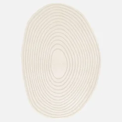 Interior rug pebble-shaped circular pattern cream