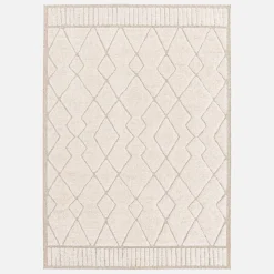 Interior rug with berber pattern, beige and cream