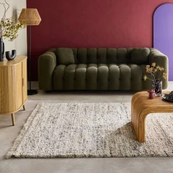 Interior rug with mottled pattern, cream