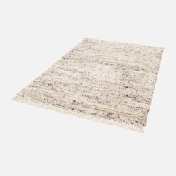 Interior rug with mottled pattern, cream