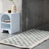 Light blue and cream checkerboard interior rug