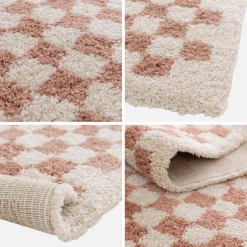 Old pink and cream checkerboard interior rug