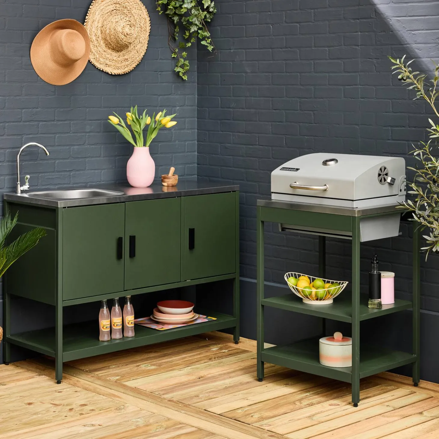 Outdoor kitchen with charcoal barbecue and 2 modules with sink