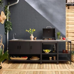 Outdoor kitchen with charcoal barbecue and 3 modules with sink
