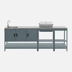 Outdoor kitchen with charcoal barbecue and 3 modules with sink