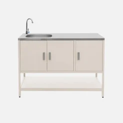 Outdoor kitchen with charcoal barbecue and 2 modules with sink