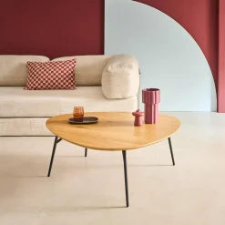 Oval coffee table with black metal legs and oak effect