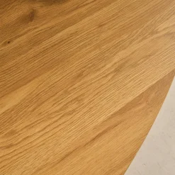 Oval coffee table with black metal legs and oak effect