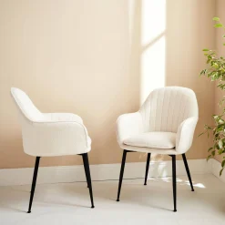 Pair of boucle fabric accent chairs with metal legs