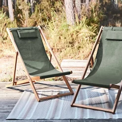 Pair of eucalyptus deck chairs with headrest cushions