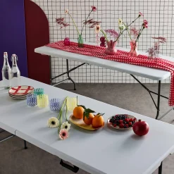 Pair of foldable plastic reception tables