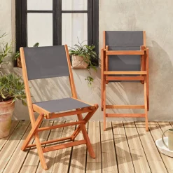 Pair of foldable wooden garden chairs
