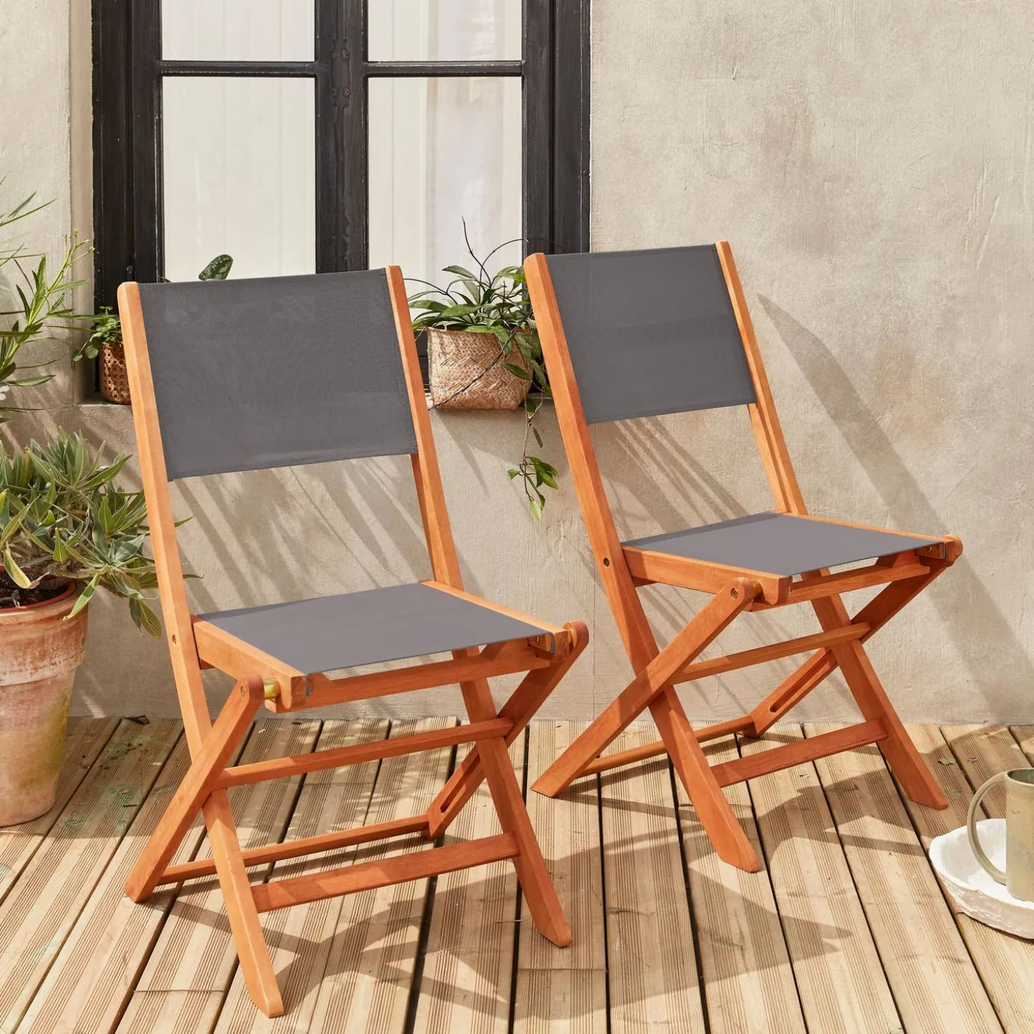Pair of foldable wooden garden chairs
