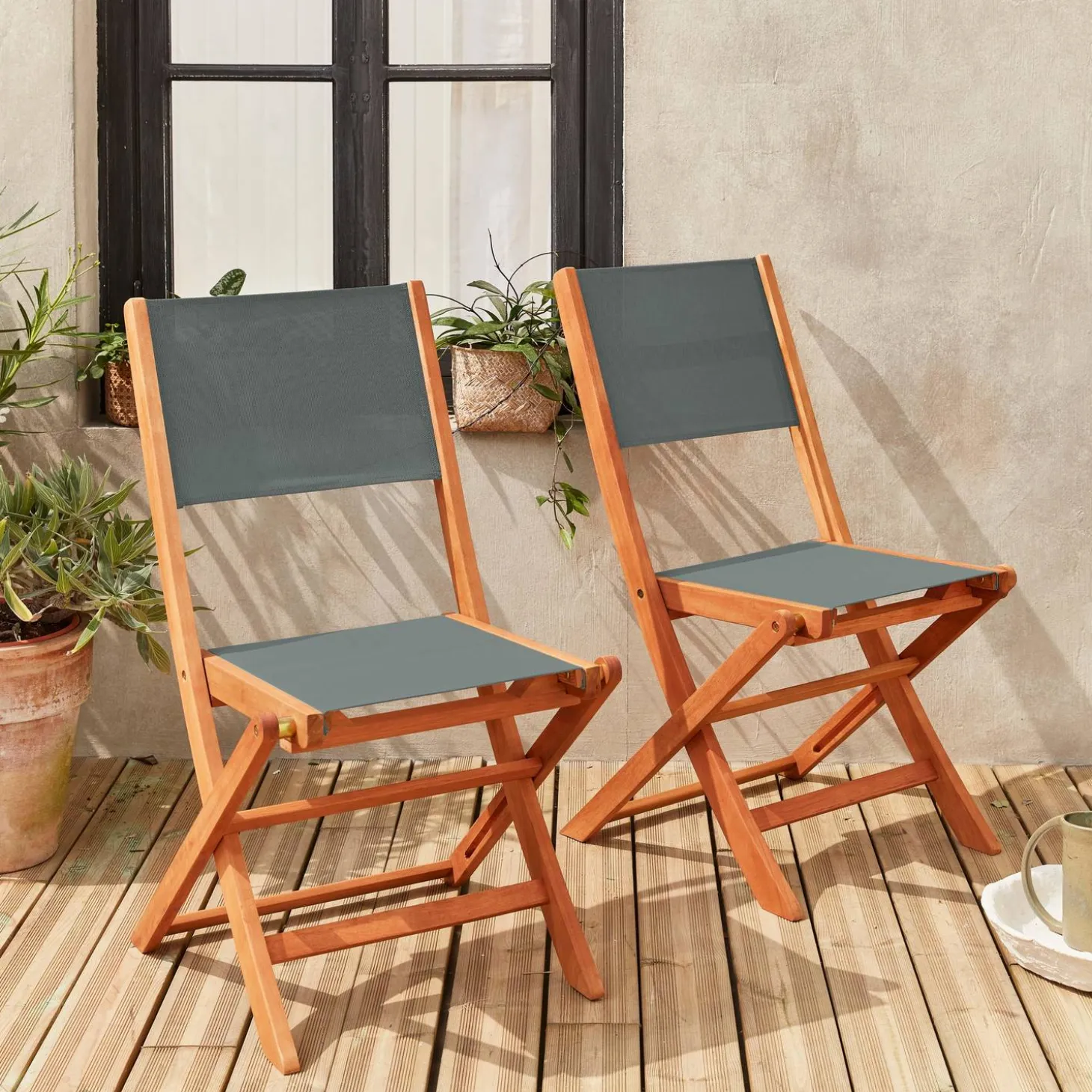 Pair of foldable wooden garden chairs