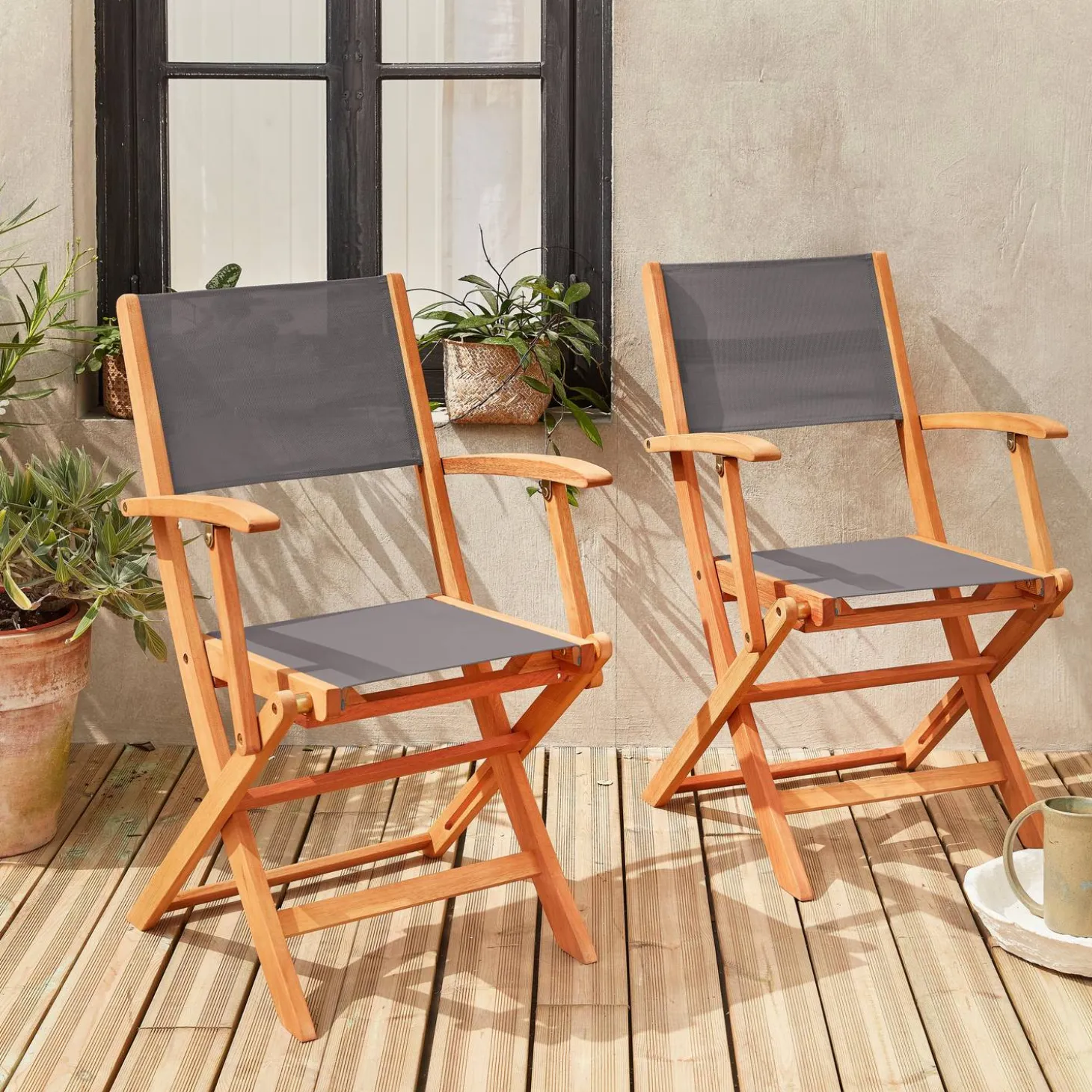 Pair of foldable wooden garden chairs