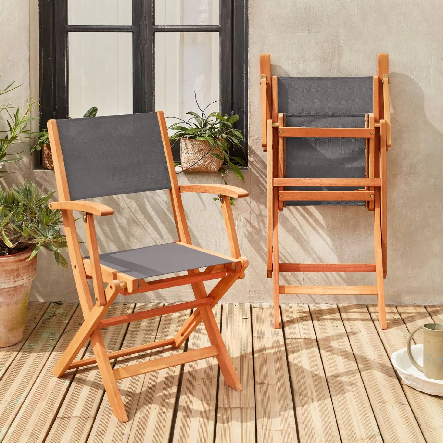 Pair of foldable wooden garden chairs