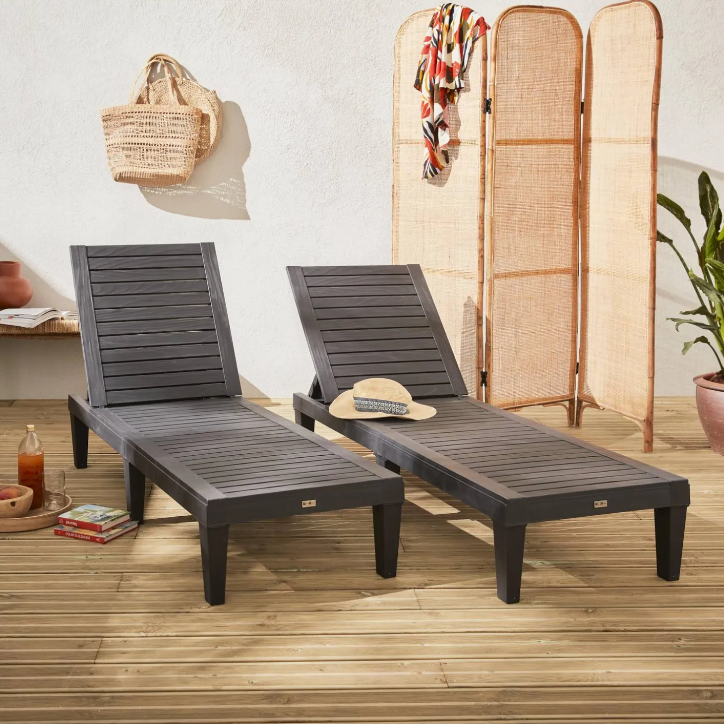 Pair of plastic sun loungers with textured wood effect